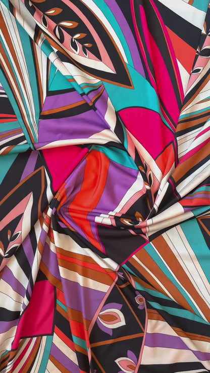 Vibrant printed jersey top with semi-open back