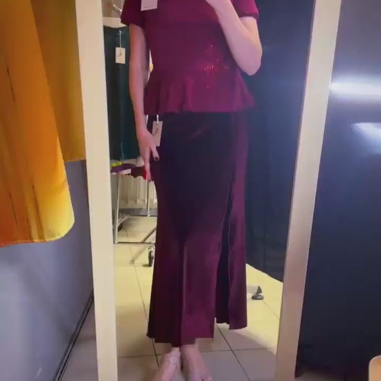 Woman in velvet bordeaux tango skirt