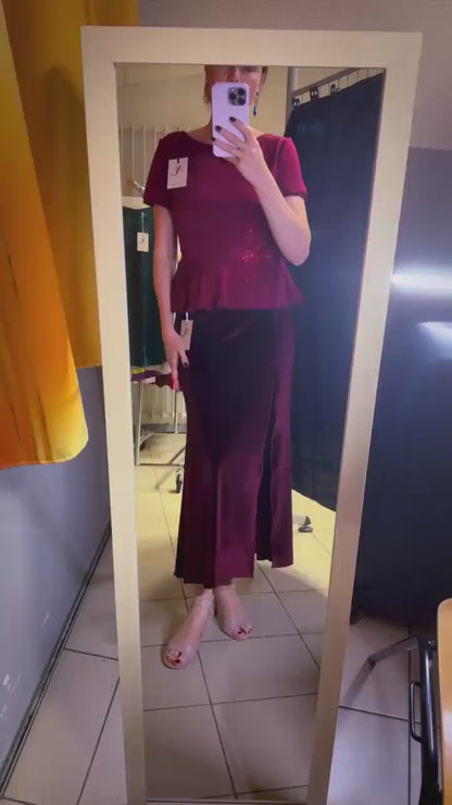 Woman in velvet bordeaux tango skirt