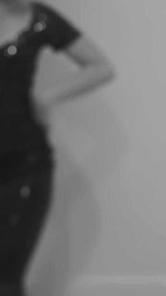 Purple shimmering velvet tango dress with asymmetric flounce