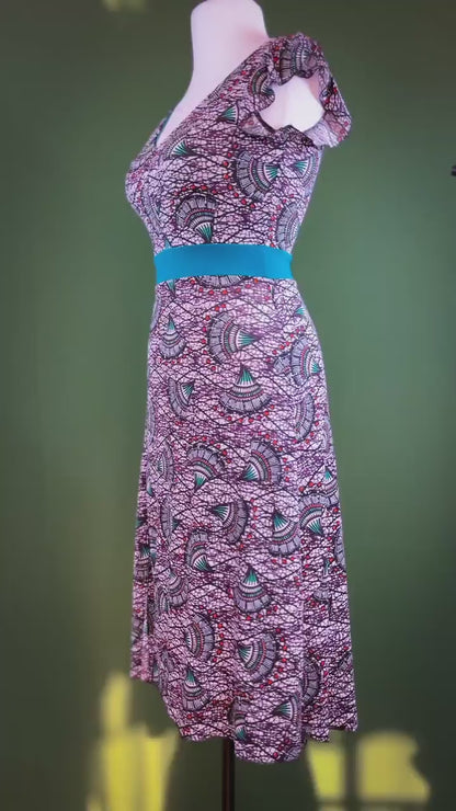 Graceful tango dress with wide skirt and back tail detail